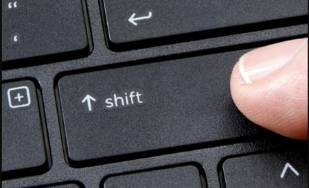 tecla shift